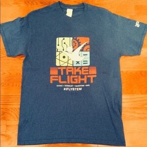 SUMMER BLUE SHIRT MAN IN FLIGHT